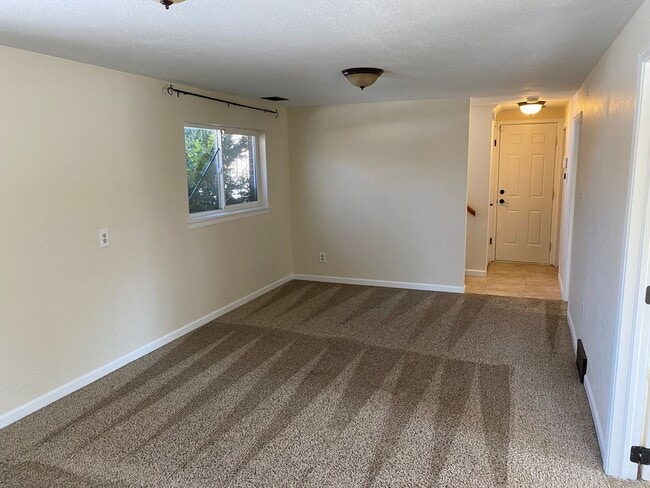 Building Photo - Great corner lot home backing up to open s...