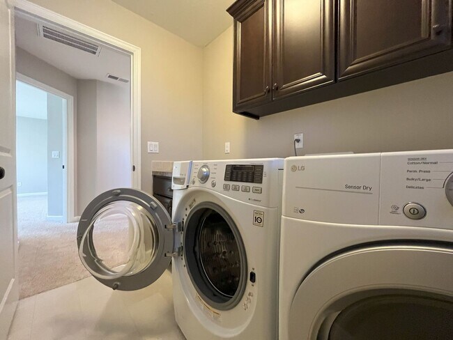 Building Photo - Spacious 4-Bedroom + Bonus Room with Modern Kitchen, Solar Panels & Private Fenced Backyard!