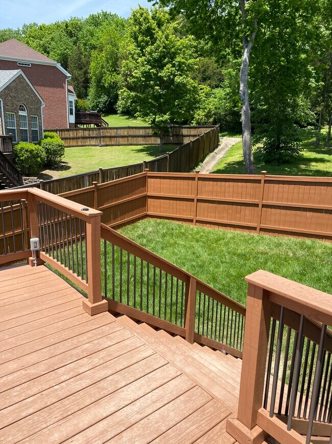 Backyard view from deck, plugs for barbecues and smokers - 709 Warmstone Ct