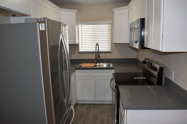 Kitchen w/ Stainless Steel Appliances, Shaker Cabinets, Quartz Countertops - 1170 Fountain St
