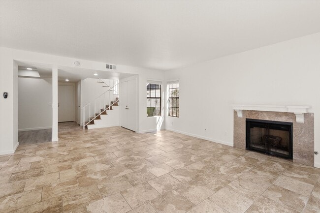 Building Photo - Renovated 2bed x 2.5bath Townhouse with Private Patio & 2-Car Garage