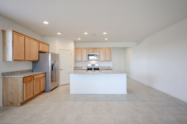 Building Photo - New 4 Bedroom + Den Home in Asante Community
