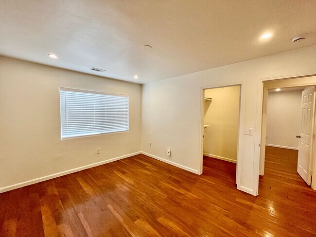 Building Photo - 4BR/3BA Large House - Single Story, No Carpet, AC, Washer/Dryer in Unit, Small Yard, 2 Car Garage...