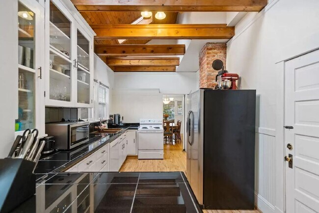 Building Photo - Welcome to this charming craftsman home ne...