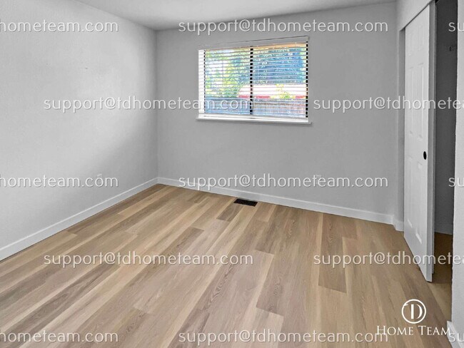 Building Photo - "Charming 3-Bedroom Retreat with Cozy Fire...