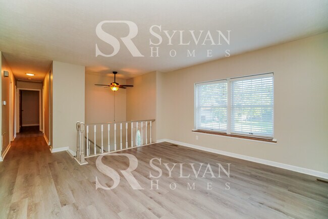 Building Photo - The living is easy in this 3 bedroom, 2.5 bathroom home