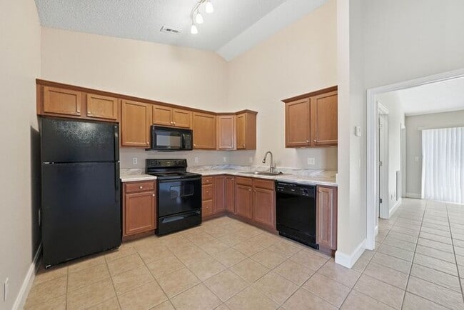 Building Photo - Single-Level Apartment Homes with Attached Private Garages – No Upstairs Neighbors