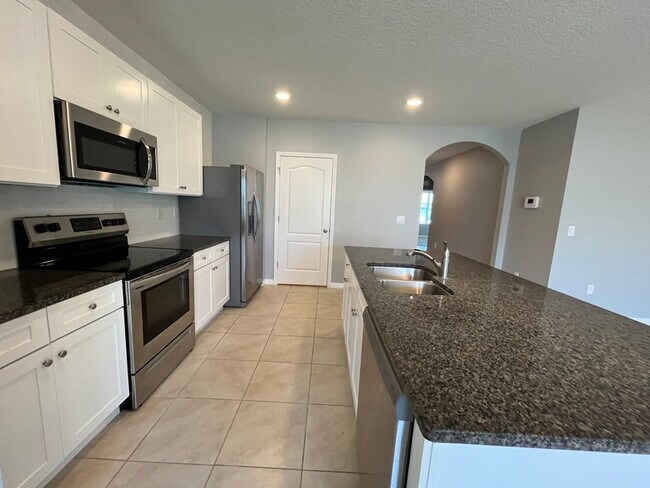 Building Photo - 5106 Fiddlewood Way