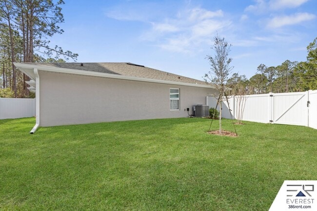 Building Photo - FULLY FENCED, LIKE- NEW 3/2/1 TOWNHOUSE ON A CUL DE SAC IN BEAUTIFUL SEMINOLE WOODS