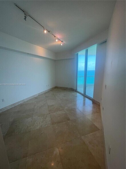 Building Photo - 16047 Collins Ave