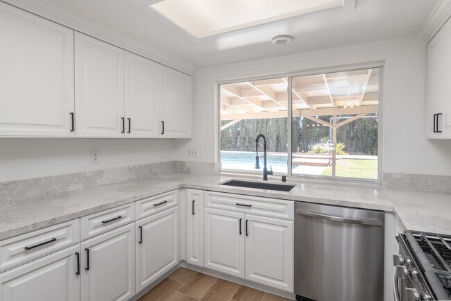 Building Photo - Spacious 3-Bedroom Home with Pool, Jacuzzi...