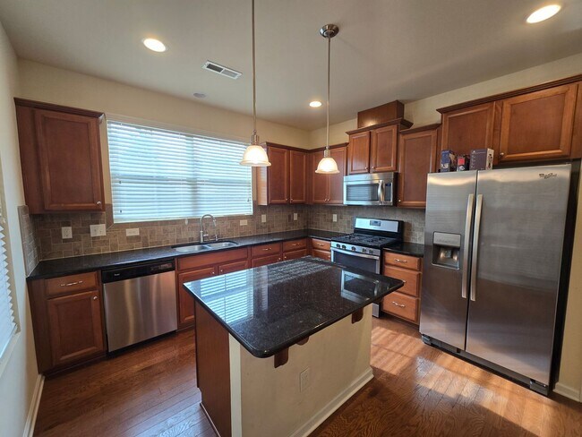 Building Photo - Classic & Comfortable West Durham Townhome with Timeless Design