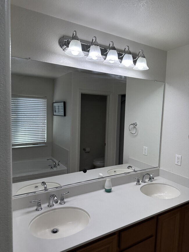 Building Photo - This stunning corner home offers 4 spaciou...