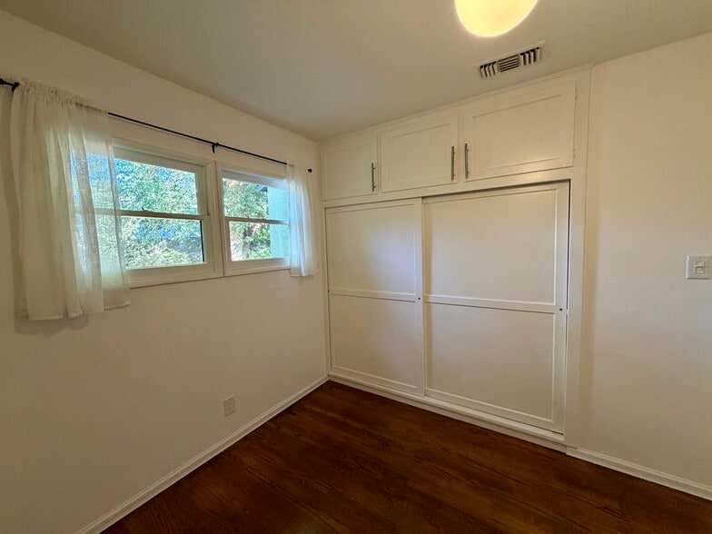 Back bedroom with big deep cabinets - 2101 Laverna Ave
