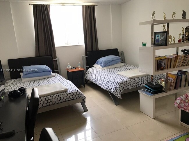 Building Photo - 19390 Collins Ave