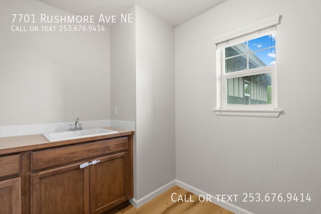 Building Photo - 7701 Rushmore Ave NE
