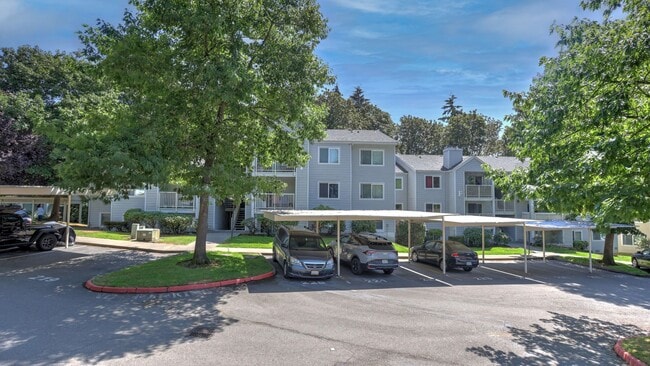 Building Photo - This ground floor corner-unit condo