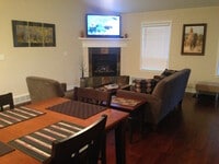 Building Photo - Contemporary Furnished 4 BR Townhome