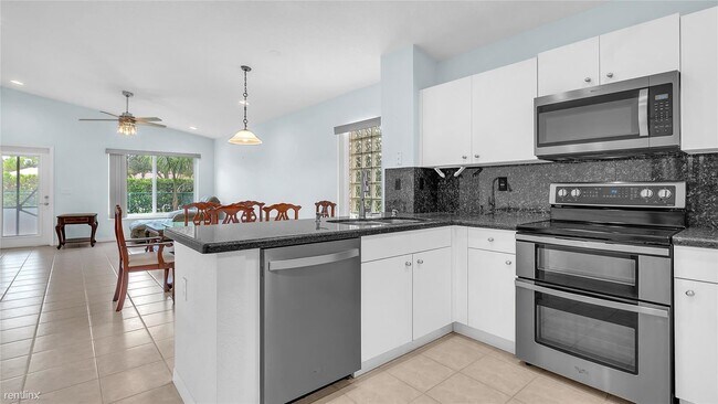 Building Photo - 3 br, 2 bath House - 5048 NW 122nd Ave