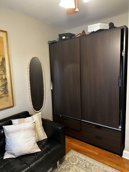 Guest bedroom with armoire and closet - 519 N Payne St