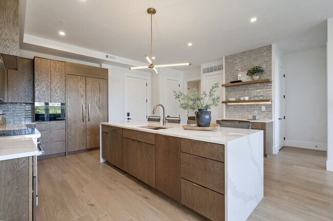 Building Photo - Fully Curated Luxury Residence with Steam Spa & EV Parking - Available Furnished, Flexible Lease ...