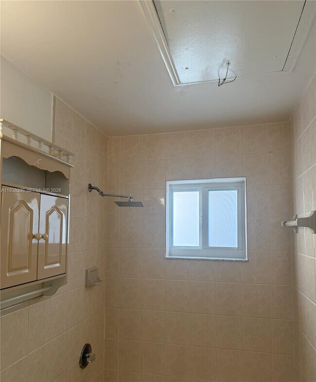 Building Photo - 10101 W Okeechobee Rd