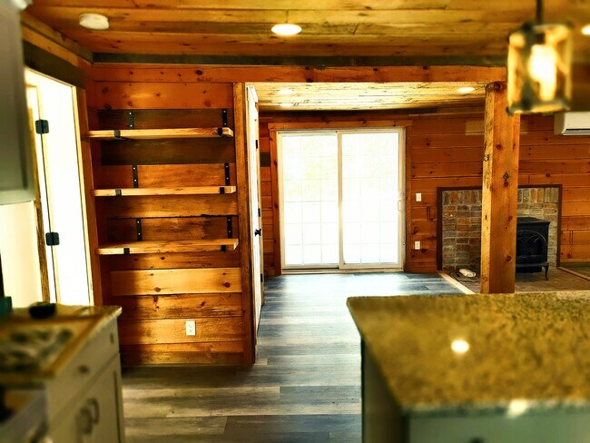 View toward private patio from living space. - 94 Cross Rd