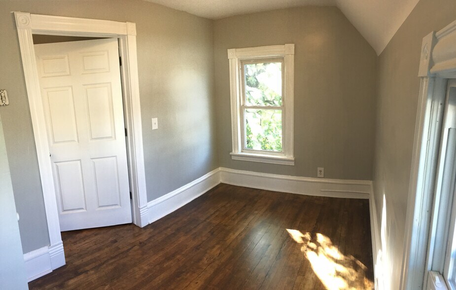 Bedroom 2 - plenty of natural light with 2 windows. Large closet as well! - 1927 Washington Street Northeast