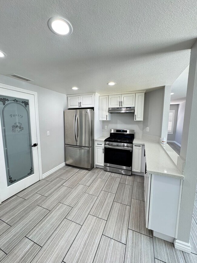 Building Photo - Beautiful 4- Bedroom Home
