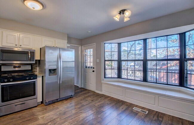 Building Photo - Welcome Home: Charming Brick Beauty with Covered Porch.