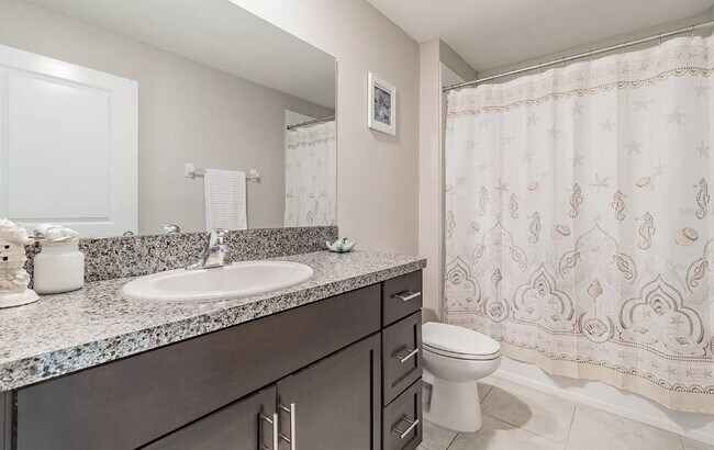 Building Photo - "Discover Spacious Comfort: 4-Bed, 2-Bath Gem in Riverview!"