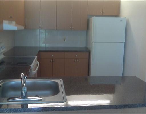 Building Photo - 11458 Royal Palm Blvd