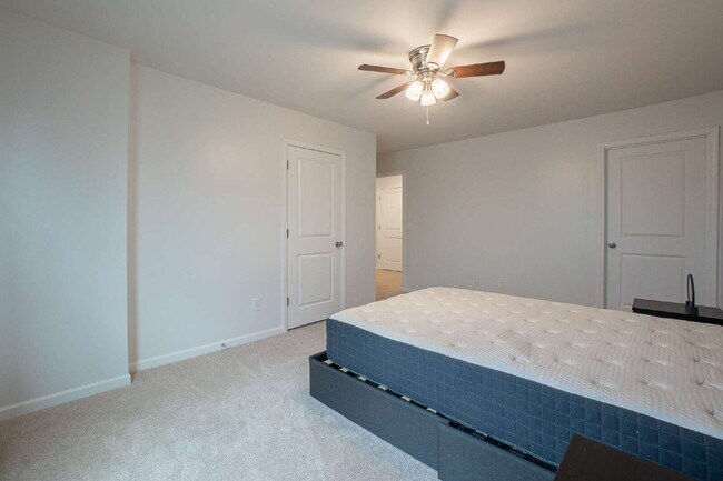 Building Photo - Partially furnished and now available!