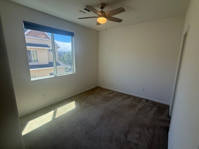 Building Photo - Large 3-Bedroom, 3.5 Bathroom Townhome in Metro Walk Village Neighborhood