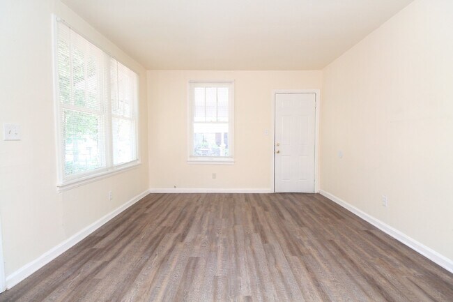 Building Photo - 2BR Cottage Home with LVP Flooring Throughout, Bonus Sunroom, Covered Parking & Low-Maintenance L...