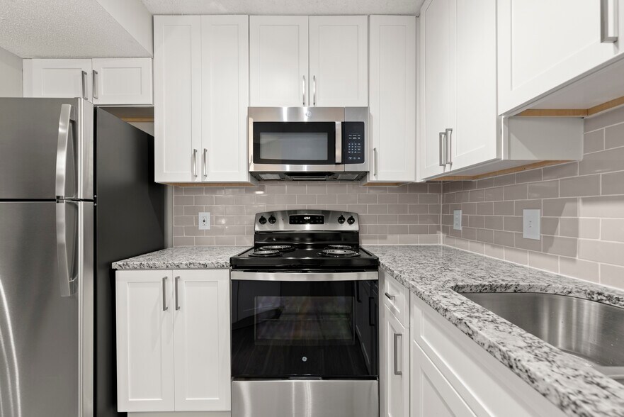 Spacious kitchen design perfect for cooking and entertaining in your home - Buckhead and Vine