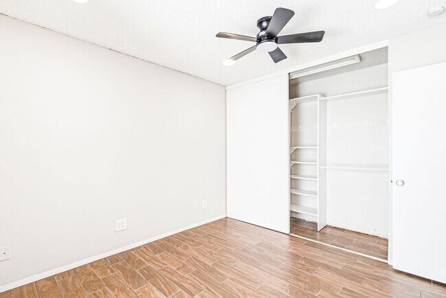 Building Photo - Gated 3-Bedroom Townhome with Fireplace, Patio & 2-Car Garage