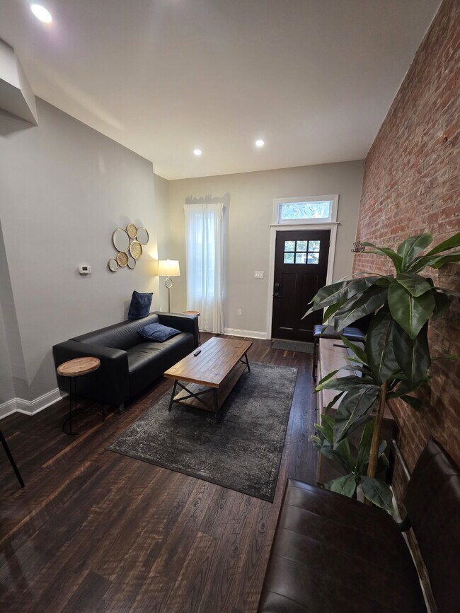 Building Photo - Chic Urban Living: Furnished 2-Bed Townhouse with Finished Basement in Pittsburgh's Strip District!