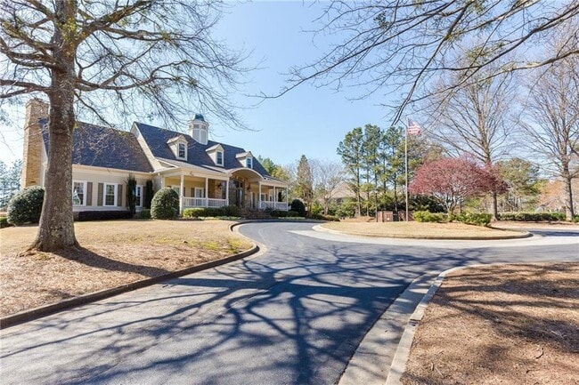 Building Photo - 9360 Nesbit Lakes Dr