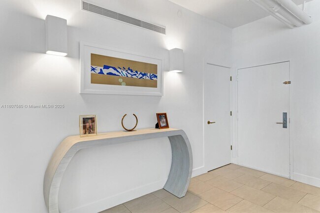 Building Photo - 10205 Collins Ave