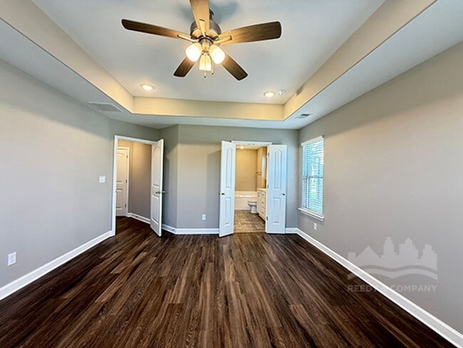 Building Photo - Welcome to this spacious 4 bedroom, 3 bath...