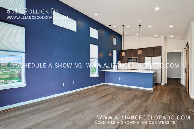 Building Photo - 6312 Rollick Dr