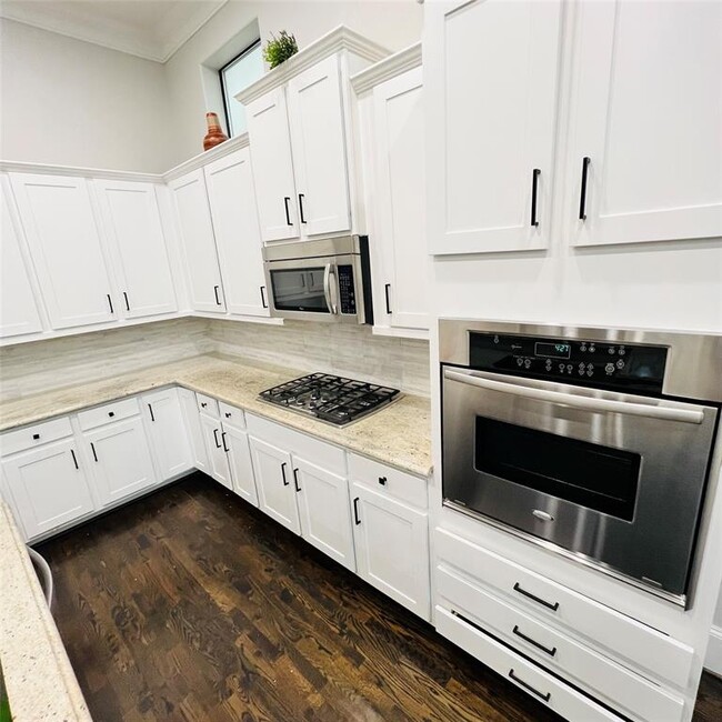 Building Photo - 9944 Woodwind Lane North