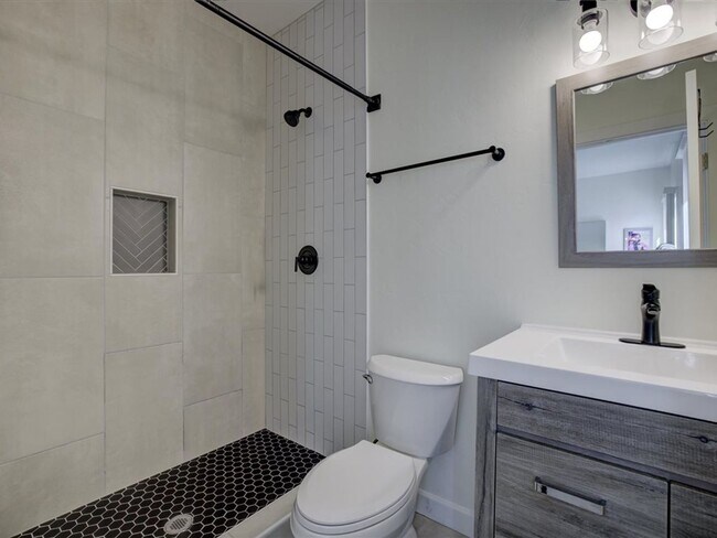 Building Photo - Fully Furnished 3-Bedroom Home with Security & Modern Upgrades