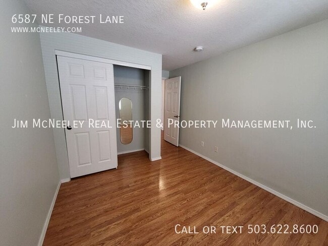 Building Photo - 6587 NE Forest Ln