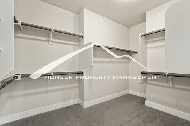Building Photo - Main Floor Primary Home in Flying Horse with 5 Bedrooms, Gourmet Kitchen, Finished Basement & 4-C...