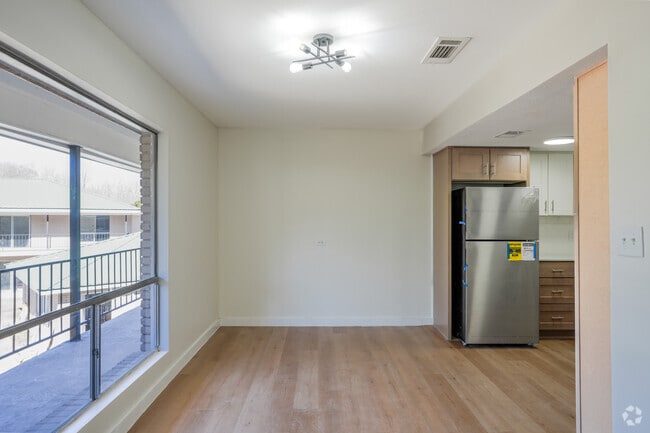 3BR, 2BA - 973SF - Dining Room / Living Room - Hidden Grove Apartments