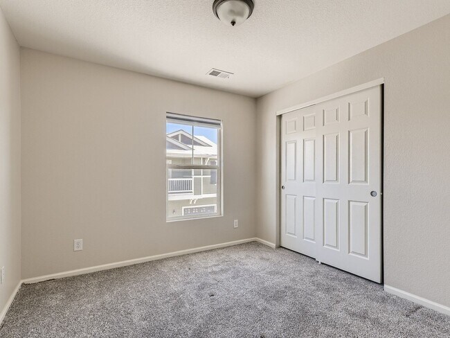 Building Photo - Evolve Real Estate: Spacious 2 Bed 2 Bath Condo with Attached Garage in Parker!