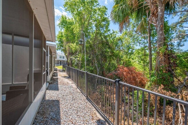 Building Photo - Furnished Townhome with Conservation View in The Bay at Cypress Creek!