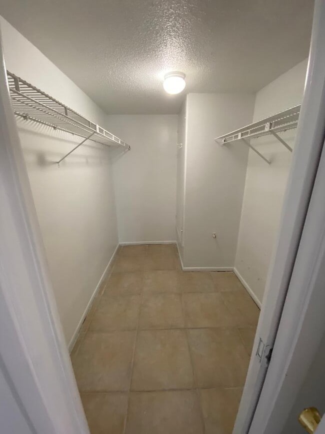 Master bedroom closet - 5600 Beach Way Dr